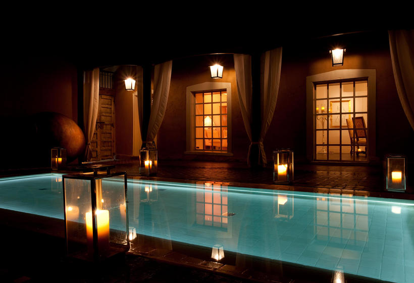 Casa Esencia reflecting pool at night